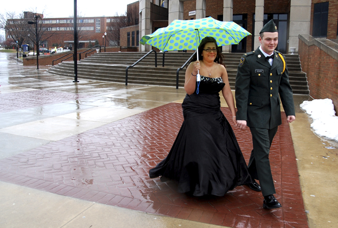 The+rain+did+not+stop+sophomores+Cathy+Howard%2C+paralegal+studies+major%2C+and+John+Richards%2C+political+science+major%2C+from+attending+the+ROTC+ball+Friday.+Photo+by+Jackie+Friedman.