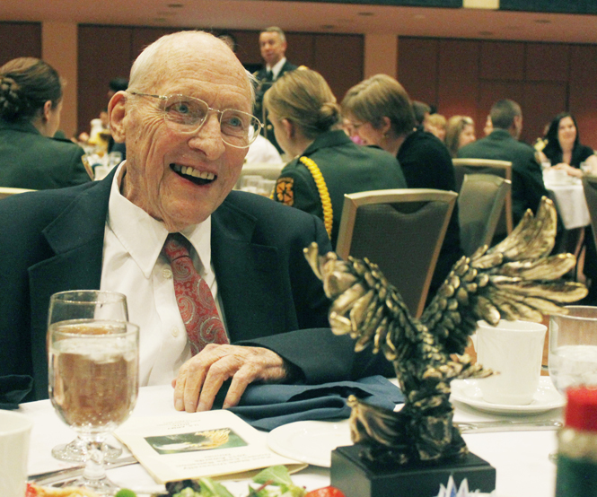 Major ret. John Lilley waits for the awards ceremony to begin during the Kent State University Golden Eagle Battalion 2011 awards dinner on Wednesday. Lilley, a 1949 Kent ROTC graduate, was inducted into the Kent State University ROTC hall of fame during the dinner. Photo by Jessica Yanesh.