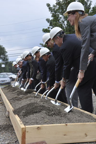 Members of Kent State University and Pizzuti Companies broke ground of the Kent hotel project Monday Sept. 19. Photo by Megan Galehouse.