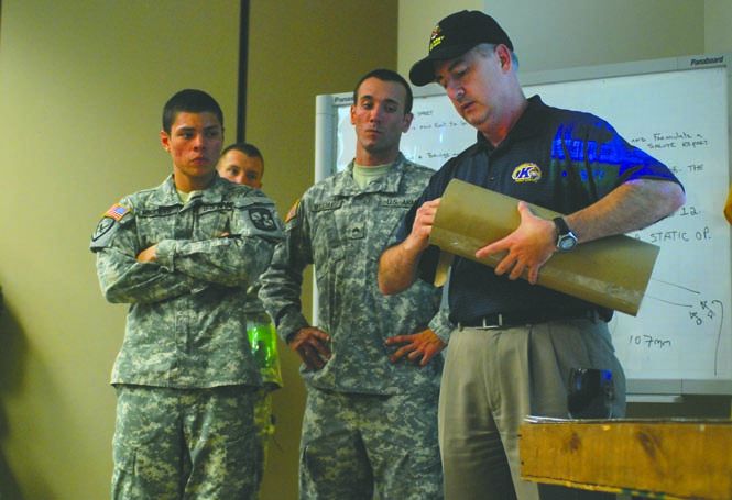 Retired LT.CLL. Terry Michaels lectured a class of cadets on improvised explosive devices at the ROTC on Oct. 26. Michaels explained that even simple devices could destroy tanks. Photo by Sam Verbulecz.
