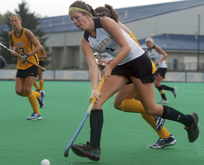 Sophomore+Alyssa+McFerren+carries+the+ball+upfield+during+the+5-2+loss+to+California+on+Monday%2C+Sept.+19.+Photo+by+Matt+Hafley.