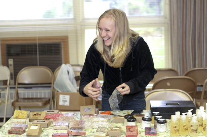 Danielle Waskowksi, of Stow, sells homemade soaps at the Stow Community Farmer's Market on Saturday, Oct. 15. Waskowski, a self-proclaimed 
