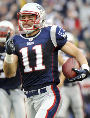 Julian Edelman of the New England Patriots runs a punt 94 yards for a touchdown against the Miami Dolphins in the second quarter. The Patriots defeated the Dolphins, 38-7, at Gillette Stadium in Foxborough, Massachusetts, Sunday, January 2, 2011. Photo by Jim Rassol courtesy of MCT Campus.