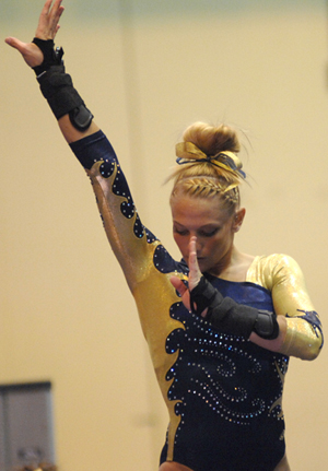 Senior Rachel Goldenberg scored an 9.900 on her floor exercise Friday, Jan. 20. The Flashes defeated Eastern Michigan at the M.A.C. Center. Photo by Emily Martin.