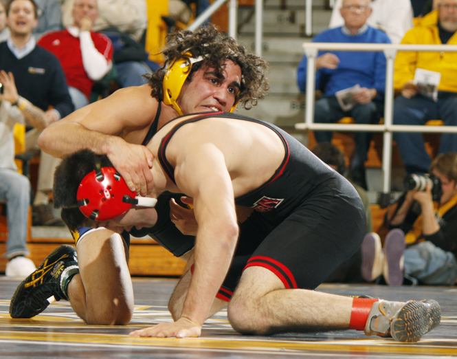 Junior Stevie Mitcheff, in the 133 weight class, defeated his opponent Izzy Montemayor 6-4 during Friday's wrestling match. The Flashes defeated Northern Illinois 37-6. Photo by Jessica Yanesh