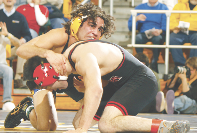 Stevie+Mitcheff%2C+in+the+133+weight+class%2C+defeated+his+opponent+Izzy+Montemayor+6-4+during+a+Feb.+21+wrestling+match.+The+Flashes+defeated+Northern+Illinois+37-6.+File+photo+by+Jessica+Yanesh.
