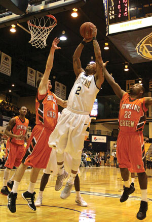 Kent guard Michael Porrini makes his way through the Bowling Green defense during Saturdays game.