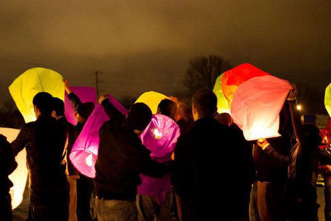 Students release paper lanterns during last years Chinese New Year festival. Photo courtesy of HOME Markets.