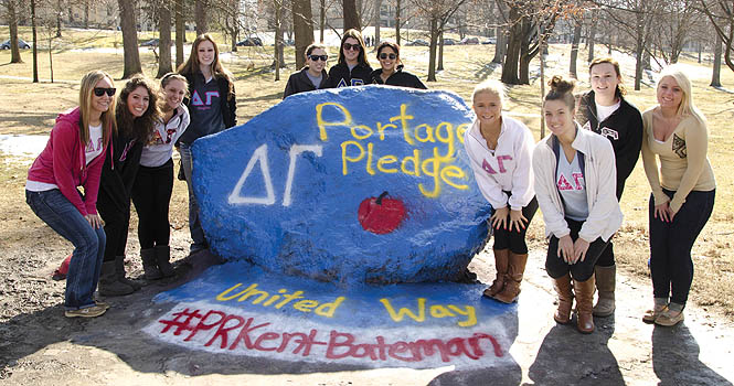 Members of the Delta Gamma sorority stand by the hilltop rock on Sunday, Feb. 26. Photo by Jacqueline Smith.