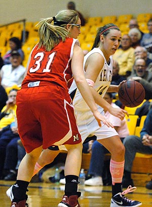 Junior guard Tamzin Barroilhet drove the ball down the court during the Flashes game against the Miami Redhawks on Wednesday, Feb. 15. Miami won in over time, with a final score of 65-69. Photo by Jenna Watson.