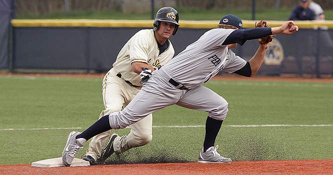 Kent outfielder T.J. Sutton slides into second base at Mural field on April 3 against Penn State. Kent State lost against the Nittany Lions 9-7. Photo by Brian Smith.