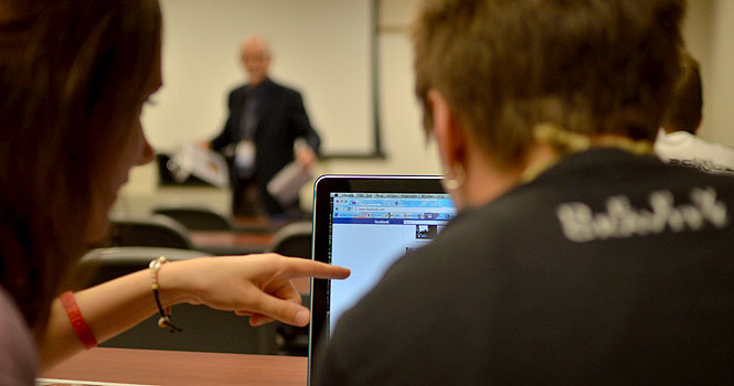 In small and large lecture halls alike, it becomes difficult for teachers to police productive Internet use, even during assessments. Photo Illustration Photo by Jacob Byk