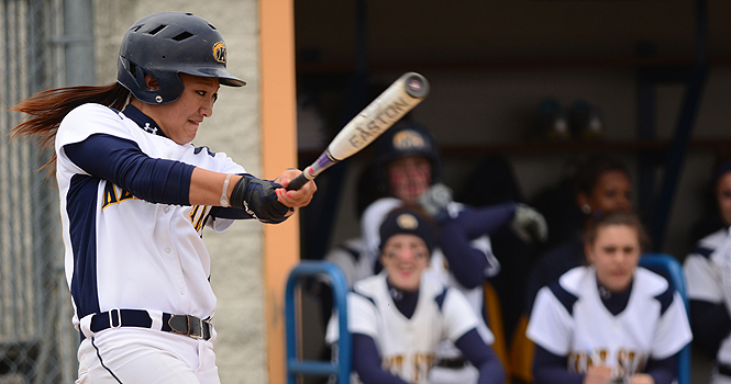 Lauren Grimes, junior outfielder, swings the bat during a doubleheader against Central Michigan on March 30. The Flashes beat the Chippewas 5-2 in game one and 3-2 in game two. Photo by Nancy Urchak.