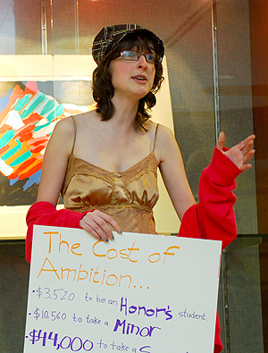 Lucy Merriman, freshman theatre design major, organized a 12 hour protest against the Ambition Penalty outside president Lester Lefton’s office in the Kent State University library. Photo by Sam Verbulecz.