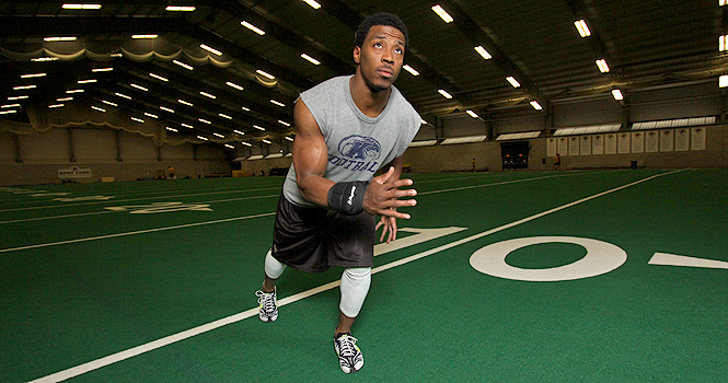 Kent State wide receiver Sam Kirkland trains in the Fieldhouse on April 23. NFL scouts are currently looking at Kirkland for next season. Photo by Brian Smith.