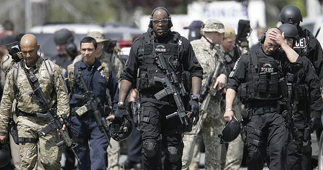 A SWAT team from the Oakland Police Department leaves the scene of a shooting at Oikos University on Edgewater Dr. in Oakland, California on Monday, April 2, 2012. Photo courtesy of MCT Campus.
