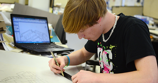Andrew Sansone, sophomore architecture major, works on a project in Taylor Hall on April 25. Photo by Nancy Urchak.