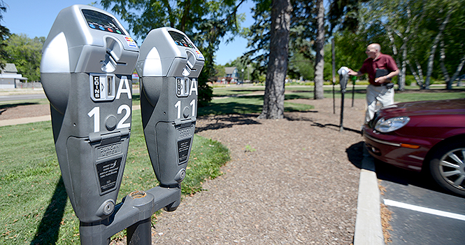 Kent State University installed 300 parking meters across campus, upgrading the current meters which were about 15 years old. Most of the new meters will now accept credit cards in addition to change. Photo by Matt Hafley.
