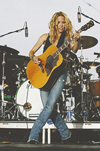 Sheryl Crow performs at the MLB All-Star Charity Concert under the Gateway Arch in July 2009. Photo courtesy of Erik Lunsford.