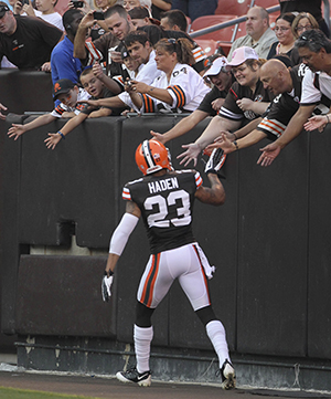 Cleveland Browns defensive back Joe Haden greets fans in the Dawg Pound before the start of the pre-season game against the Philadelphia Eagles at Cleveland Browns Stadium in Cleveland, Ohio, Friday, August 24, 2012. (Akron Beacon Journal/MCT). Photo by Ed Suba Jr.