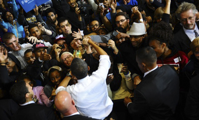 U.S. President Barack Obama interacts with students and member so the community after his campaign speech in the M.A.C. Center Wednesday. Obamas speech covered topics like keeping jobs in American and taking care of veterans. Photo by Laura Fong.