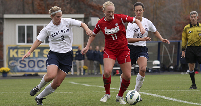 Kent State Madison Helterbran competes for the ball against a Northern Illiouns player at Zoeller Field on Oct. 19. Kent State lost the match 0-1. Photo by Brian Smith.