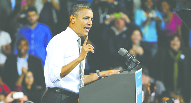 United+States+President+Barack+Obama+campaigns+to+a+crowd+of+6%2C600+at+the+Memorial+Athletic+and+Convocation+Center+on+Wednesday%2C+Sept.+26.+Obama+is+the+first+president+to+visit+Kent+State+University+in+a+century.+His+speech+included+discussion+of+the+job+market%2C+and+the+need+for+equal+inclusion+and+opportunity+for+all+Americans.+Photo+by+Jenna+Watson.