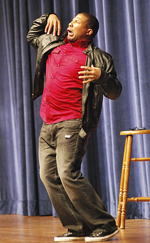 Comedian Tony Tone performs at the annual Black United Students homecoming comedy show on Saturday. Photo by RACHAEL LE GOUBIN.