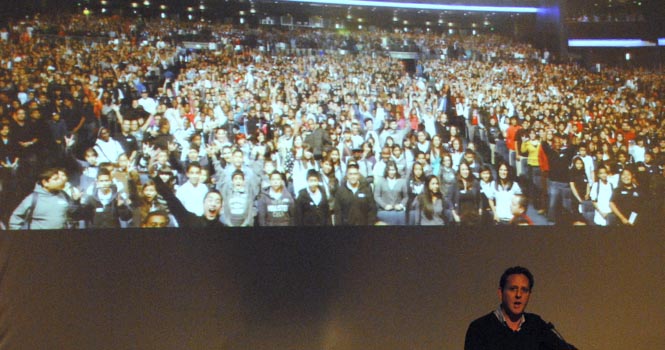 Documentary filmmaker Lee Hirsch speaks at Kent State Stark on Monday, Oct. 8, showing a picture behind him of an audience of 7,000 kids who saw the movie recently . Hirsch spoke about his 2011 film, Bully, elaborating on the characters stories, his experience and the inspiration to create the film. Hirsch encouraged the audiences participation with a question and answer at the end. Photo by Jenna Watson