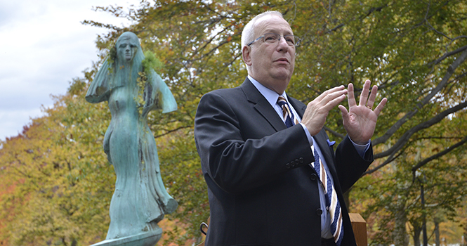 Kent State University President Lestor Lefton outside at the sculpture induction ceremony for Robert Wicks work titled Sidney, on Oct. 19. Photo by JACOB BYK.