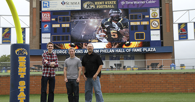 TeleProductions Graphic Designer Jim Hurguy (right) and student designers Alex Kurr (left) and Brian Recktenwald (middle) created the Kent State University Football 2012 Kickoff Video, which plays at the beginning of each home game at Dix Stadium. The video was featured on ESPN.coms Playbook Visuals blog September 2 as one of blogger Patrick Dorseys favorite college football entrance videos. Photo by Shane Flanigan