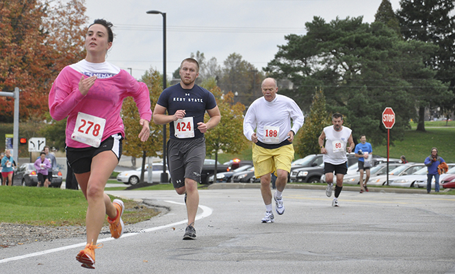 Participants of the 2011 Bowman Cup run along the course on Oct. 15, 2011. Photo by MEGANN GALEHOUSE.