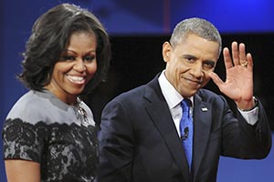 President+Barack+Obama+waves+to+the+audience+as+he+and+first+lady+Michelle+Obama+exit+the+stage+at+the+end+of+the+final+presidential+debate+at+Lynn+University+in+Boca+Raton%2C+Florida+on+Monday%2C+October+22%2C+2012.+%28Robert+Duyos%2FSun+Sentinel%2FMCT%29