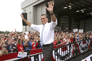 Republican+presidential+candidate+Mitt+Romney+responds+to+cheering+supporters+at+an+airport+rally+in+Kissimmee%2C+Florida%2C+Saturday%2C+October+27%2C+2012.+%28Joe+Burbank%2FOrlando+Sentinel%2FMCT%29