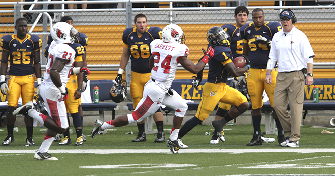 Kent State running back Dri Archer escapes from Ball State player Jeffery Garrett during the Sept. 29 game at Dix Stadium. The Flashes won the game against the Cardinals 45-43. Photo by BRIAN SMITH.