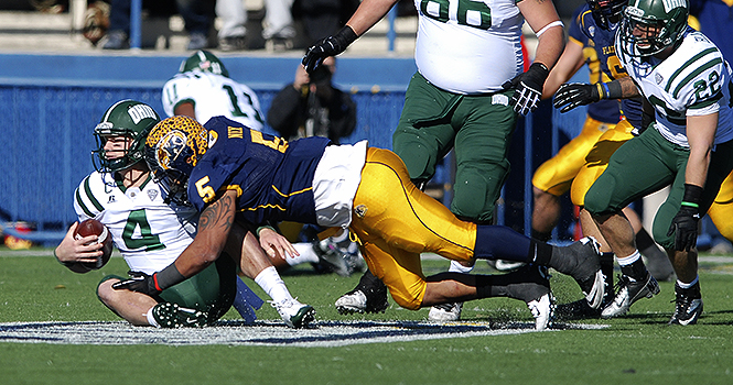 Junior Defensive lineman Roosevelt Nix sacks Ohios quarterback Tyler Tettleton during Kents 28-6 win over the Bobcats on Nov. 23, 2012. The Flashes will face Northern Illinois for the Mid American Conference championship game in Detroit on Friday, Nov. 30 at 7 p.m. Photo by MATT HAFLEY.