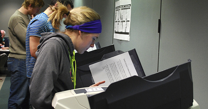 Katie Shields, a freshman at Kent State, votes at the Rec Center on November 6 2012. Photo by Melanie Nesteruk.