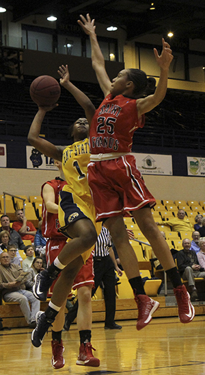 Junior guard Ashley Evans goes up for a shot against her St. Francis (Pa.) opponent during an 81-67 home loss Wednesday, Nov. 28. The Kent State womens basketball team fell to 0-6.. Photo by Shane Flanigan.