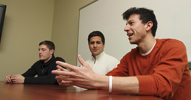 Kent State computer science majors David Steinberg (right), Daniel Gur (middle) and Camden Fullmer (left) are the developers of Facewash, a Facebook app which allows users to search through their activity and content and remove potentially unwanted materials from public view. Photo by Shane Flanigan.