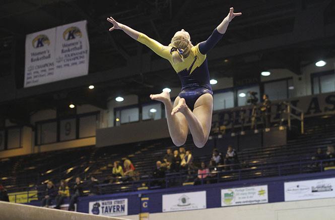 Kent State sophore Whitnee Johnson performs a routine on the balance beam during a home meet against George Washington and Western Michigan on Jan. 25, 2013. Photo by Melanie Nesteruk.