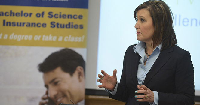 Lt. Gov. Mary Taylor speaks during a press conference about the insurance program offered at the Salem Campus. Photo by Bob Christy.
