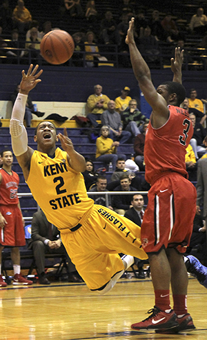 Freshman guard Kellon Thomas attempts a shot while falling to the court during Kent States 73-71 College Insider Tournament win over Fairfield on Wednesday, March 20 at the MACC. Photo by Shane Flanigan.