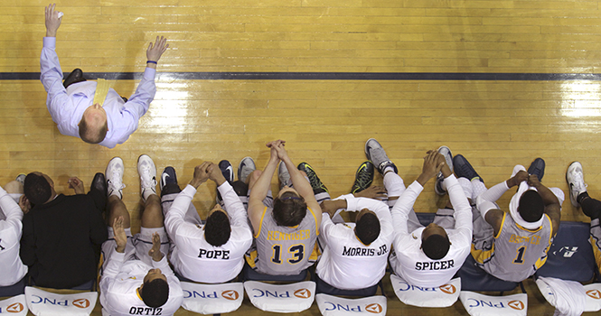 The mens basketball team watches the game from the bench as Kent State defeated Akron 68-64 on Friday, March 8, 2013 at James A. Rhodes Arena. The win snapped a five-game losing streak to the Zips. Photo by SHANE FLANIGAN.