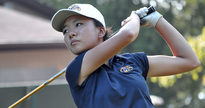 Jennifer Ha watches her drive while playing for the golf team in 2012. Ha was named MAC Freshman of the Year during the 2011-12 season. Photo courtesy of Kent State Athletics.