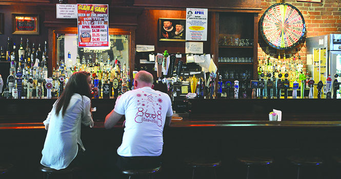 A couple sits at the bar during lunchtime at Rays Place on April 10, 2013. Ray’s Place will be named as the first sports bar in Ohio on April 22, by the Ohio Licensed Beverage Association. Photo by Jenna Watson.