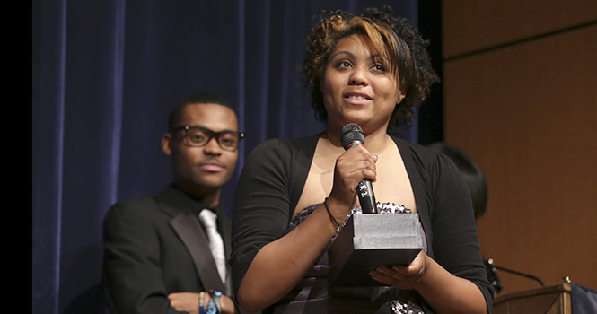 Jinre Holman, an accounting sophomore, receives the Rising Star Award during the Ebony Achievement Awards on Wednesday April 24, 2013 in the Student Center Ballroom. Photo by Brian Smith.