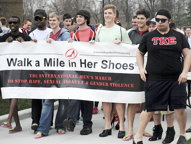 Participants met at Risman Plaza on Tuesday, Apr. 16 to march against sexual violence. Walk a Mile in Her shoes is a nationwide event where men walk a mile in high heels to experience what its like to be a woman.