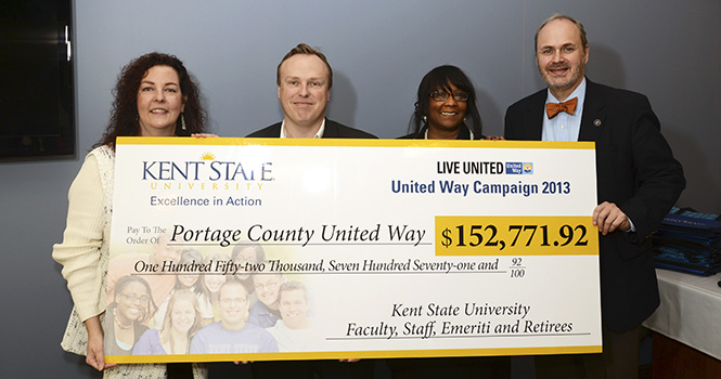 Kent+State+University+the+number+one+donor+to+the+United+Way+of+Portage+County%2C+celebrates+a+successful+2013+campaign%2C+raising+%24152%2C771.92+for+the+United+Way+of+Portage+County.+Pictured+are+Stephanie+Rummel%2C+director+of+development+at+the+United+Way+of+Portage+County%3B+Steve+Kleiber%2C+president+and+CEO+of+the+United+Way+of+Portage+County%3B+Iris+Harvey%2C+vice+president+for+university+relations+at+Kent+State%3B+and+Todd+Diacon%2C+senior+vice+president+for+academic+affairs+and+provost+at+Kent+State.+Photo+courtesy+of+Kent+State+University.