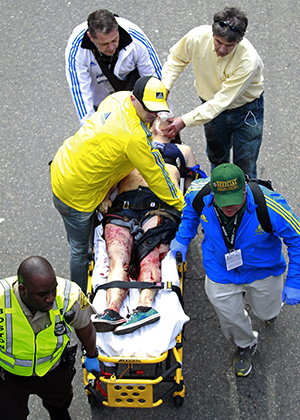 Three dead and more than 130 injured in Boston Marathon bombings