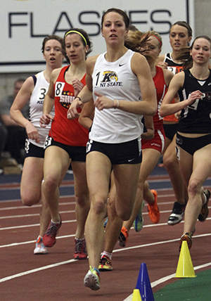 Junior distance runner Paige Foster runs in the womens mile during the Kent State Tune Up track and field meet in the field house on Saturday, Feb. 16, 2013. Foster placed 11th with a 5:22.54 . Photo by Matt Hafley.